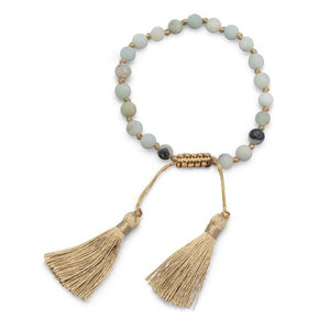 Casual, trendsetter adjustable gemstone bracelet. Tassel with amazonite beads brings bohemian style to all us adventure seekers.